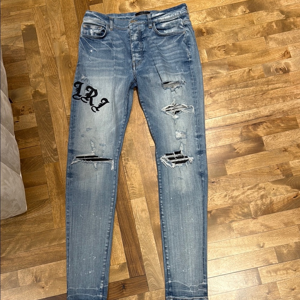 AMIRI Blue Skinny Distressed Jeans